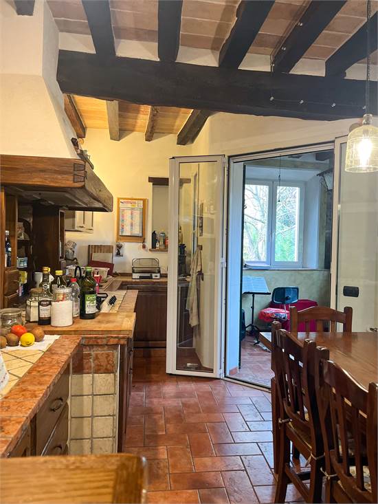 sala da pranzo con angolo cottura