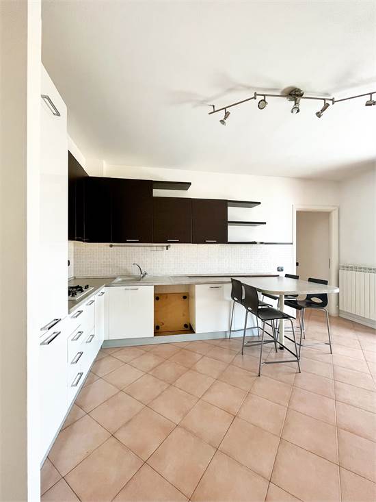 soggiorno con angolo cottura